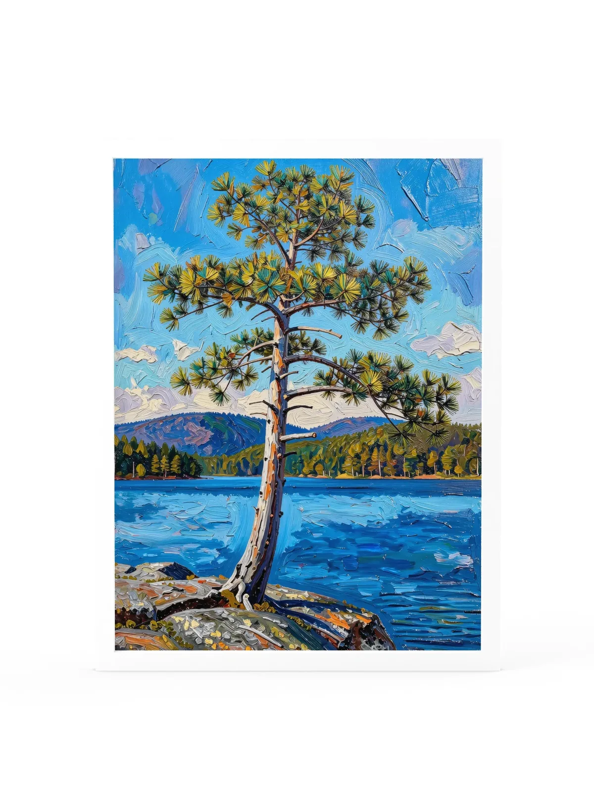 White Pine on the Point as an 18 by 24 inch framed print in a white frame: a lone white pine leaning out from a granite point over a blue lake, with low mountains on the far shore, in bold oil-painting brushstrokes.